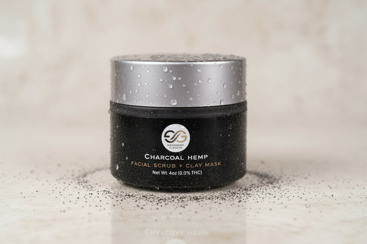 Black jar with silver lid on a gray background